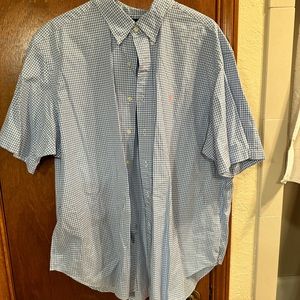 Almost new polo button up dress shirt. Will ship out asap.